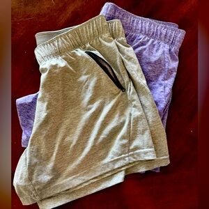 Two pairs of athletic lounge shorts.